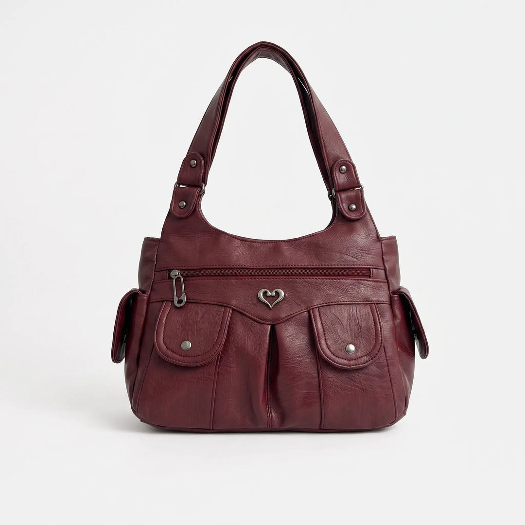 Soft shoulder bag slightly slouchy silhouette, side view