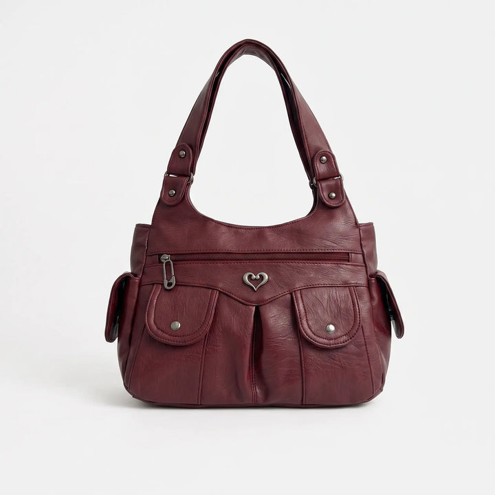 Soft shoulder bag slightly slouchy silhouette, side view