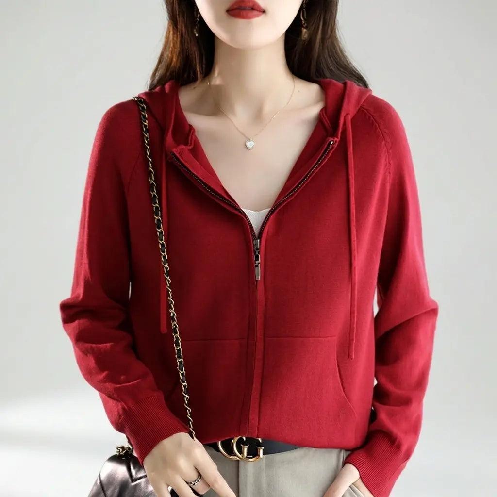 Red women's knit zip-up hoodie with full-zip and hip pockets, front view