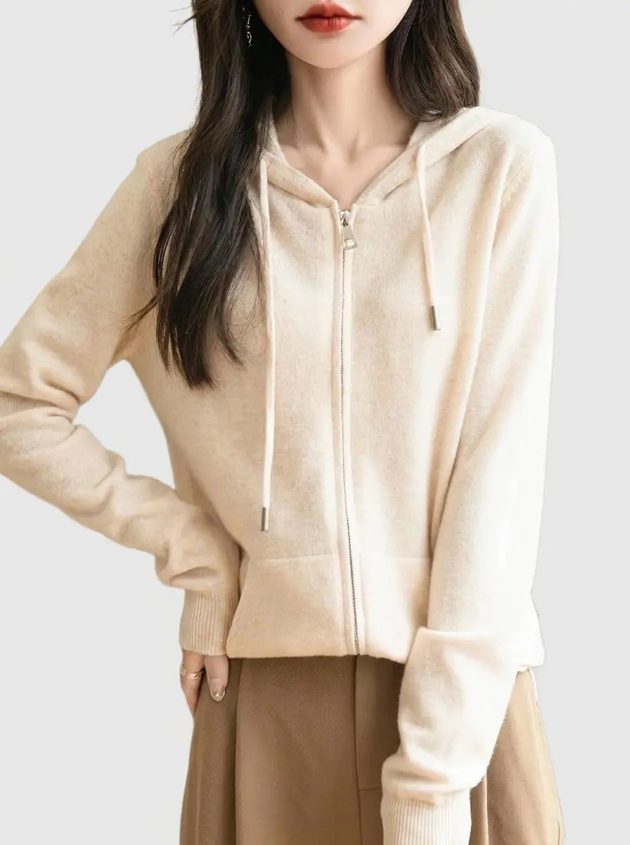 Beige women's zip-up knit hoodie with drawstring hood and kangaroo pocket, front view