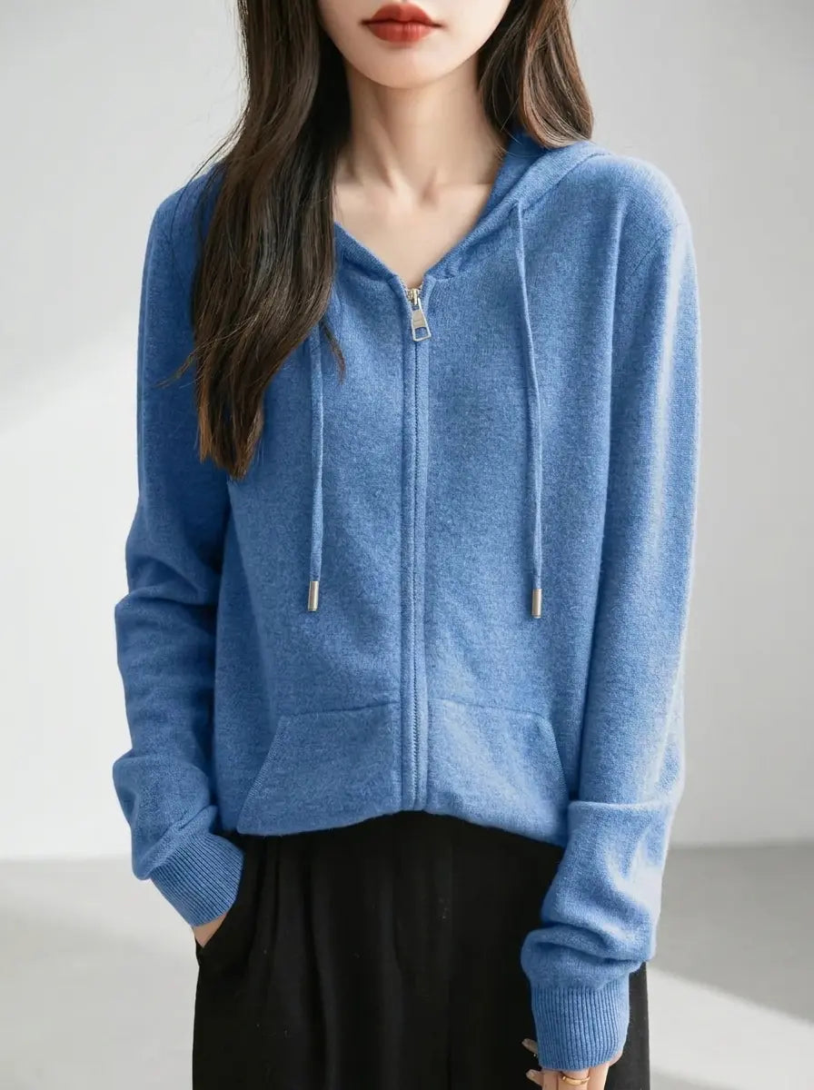 Women's knit zip-up hoodie in blue with full-zip and drawstring hood, front view