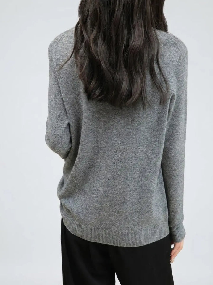 Merino wool crewneck sweater in grey, clean back view with seamless finish