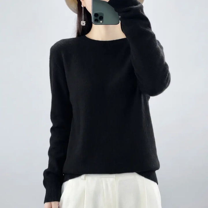 Merino wool crewneck sweater in black, long sleeves with ribbed cuffs