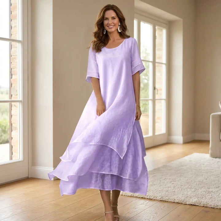 Lavender tiered midi dress with short sleeves and contrast trim detail