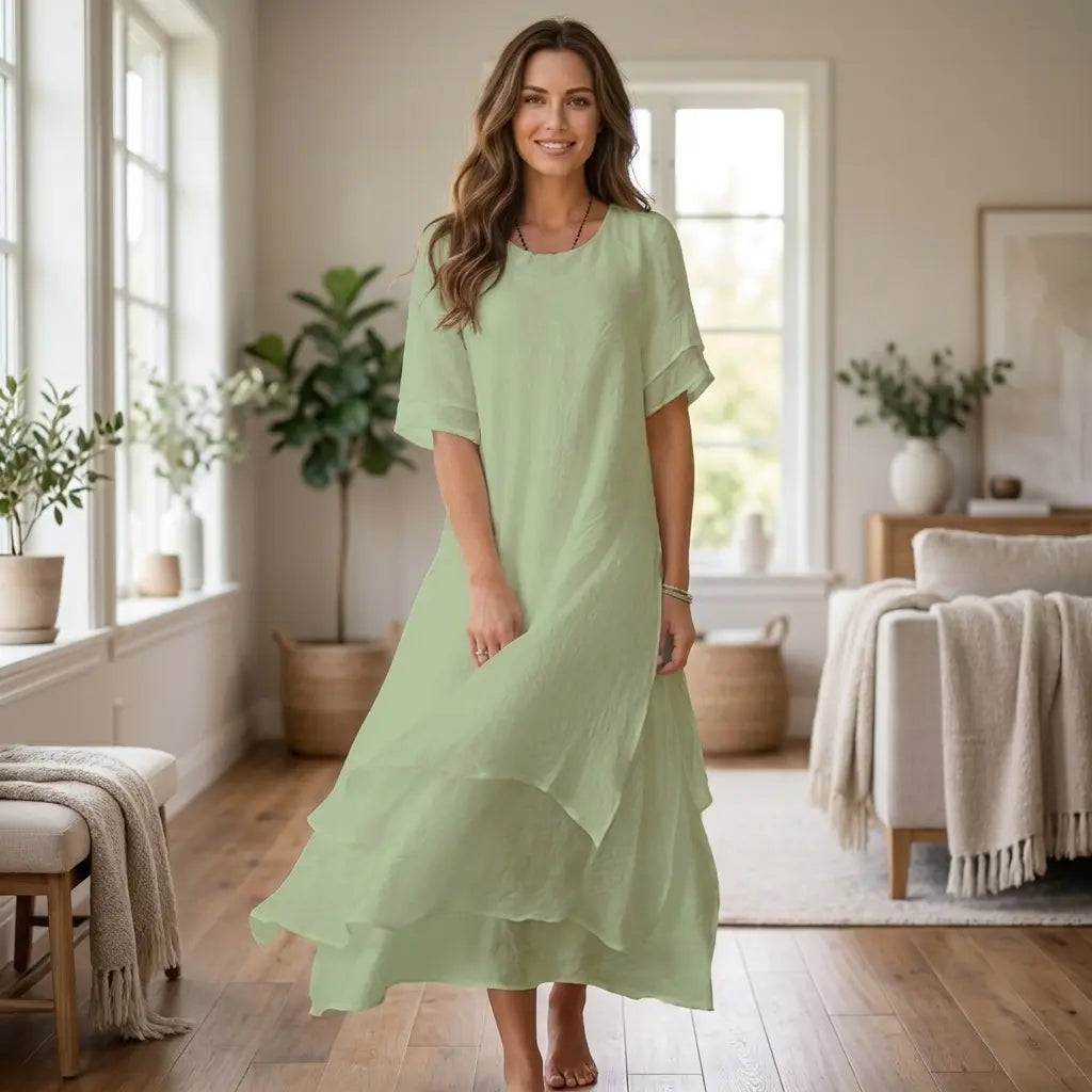Sage green layered midi dress with folded short sleeves, front view