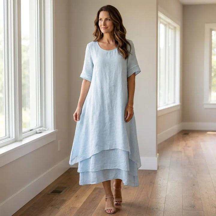 Light blue layered midi dress with scoop neck and tiered skirt
