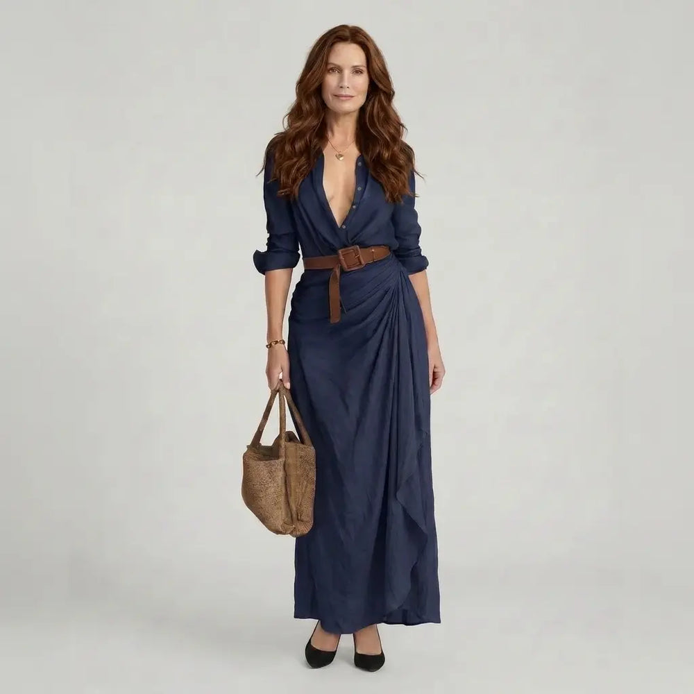 Women's maxi shirt dress in navy blue with deep V-neck, wrap drape and waist belt, front view