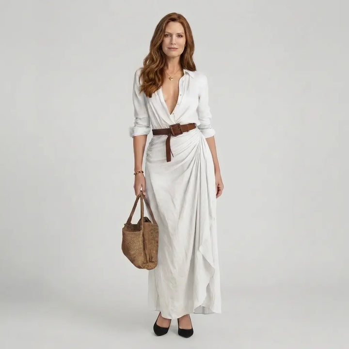 Women's maxi shirt dress in white with deep V-neck, wrap drape and waist belt, front view