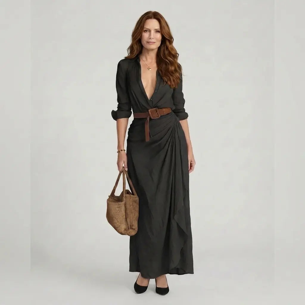 Women's maxi shirt dress in black with deep V-neck, wrap drape and waist belt, front view