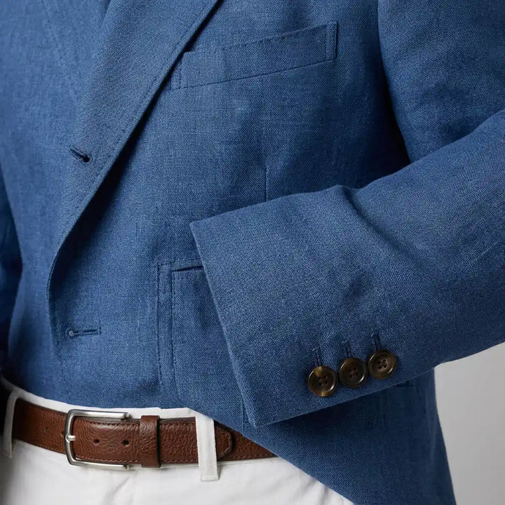 Close-up of textured knit weave on brown blazer