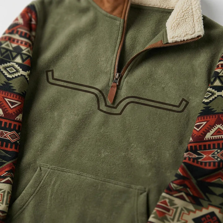 Quarter-zip detail with brown zipper pull, sherpa collar and embroidered longhorn motif
