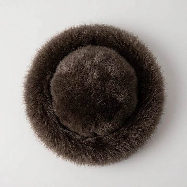 Black faux fur winter hat, flat-lay product photo