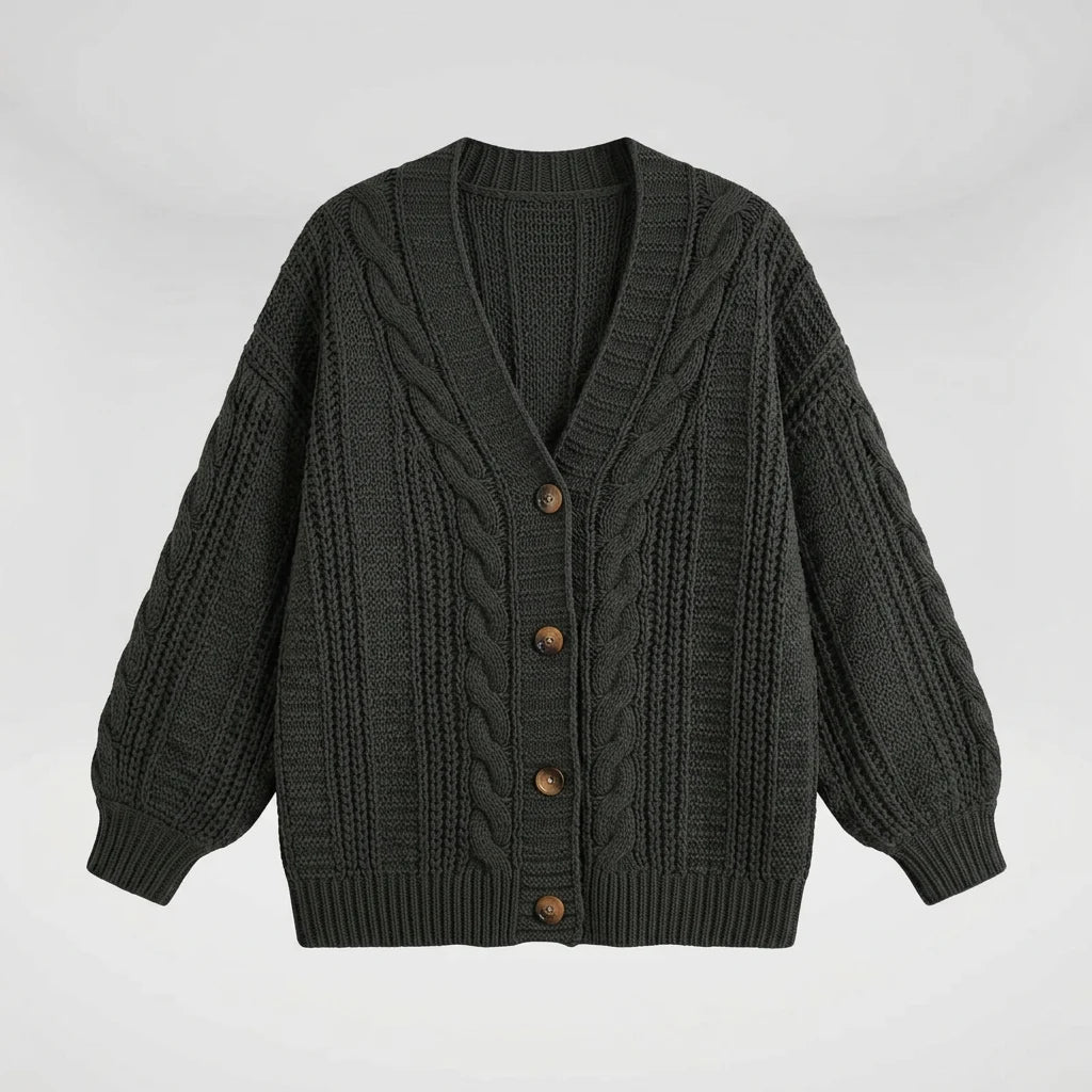 Cable knit cardigan sweater flat lay showing V-neckline and button closure