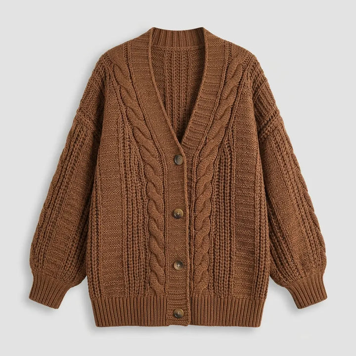 Women's chunky cable knit cardigan flat lay in beige, showing full front view