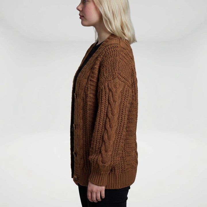 Women's cable knit cardigan sweater back view showing relaxed silhouette