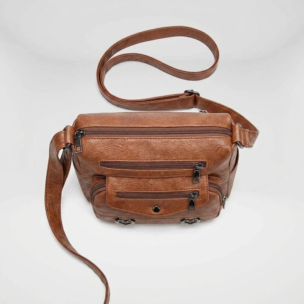 Brown shoulder bag top-down view showing structured shape and compartments
