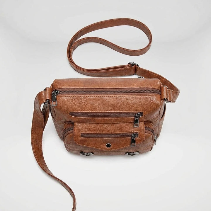 Brown shoulder bag top-down view showing structured shape and compartments